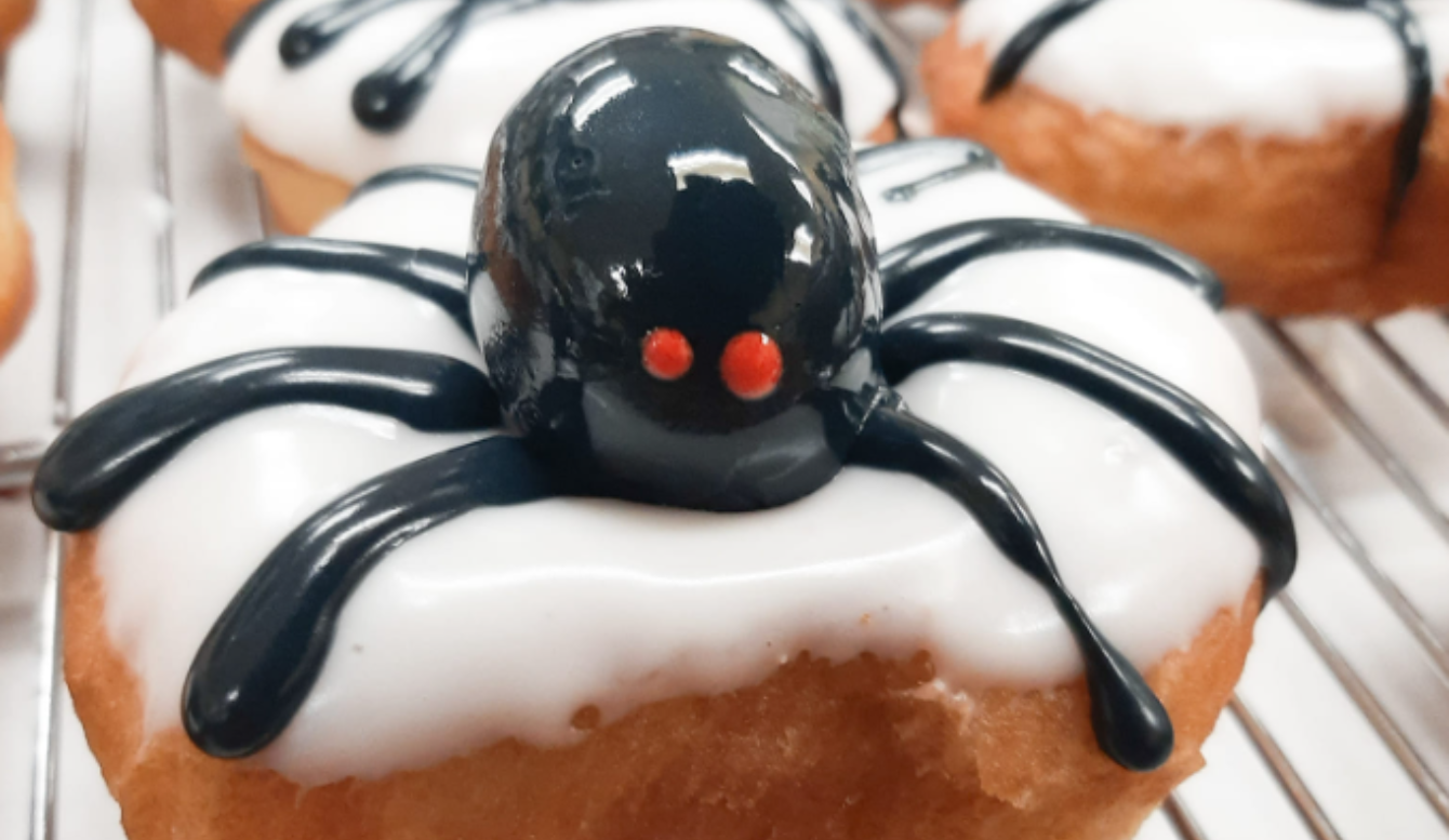 Halloween spider donut with white icing and black icing design from Laila’s Place in Newberry, SC